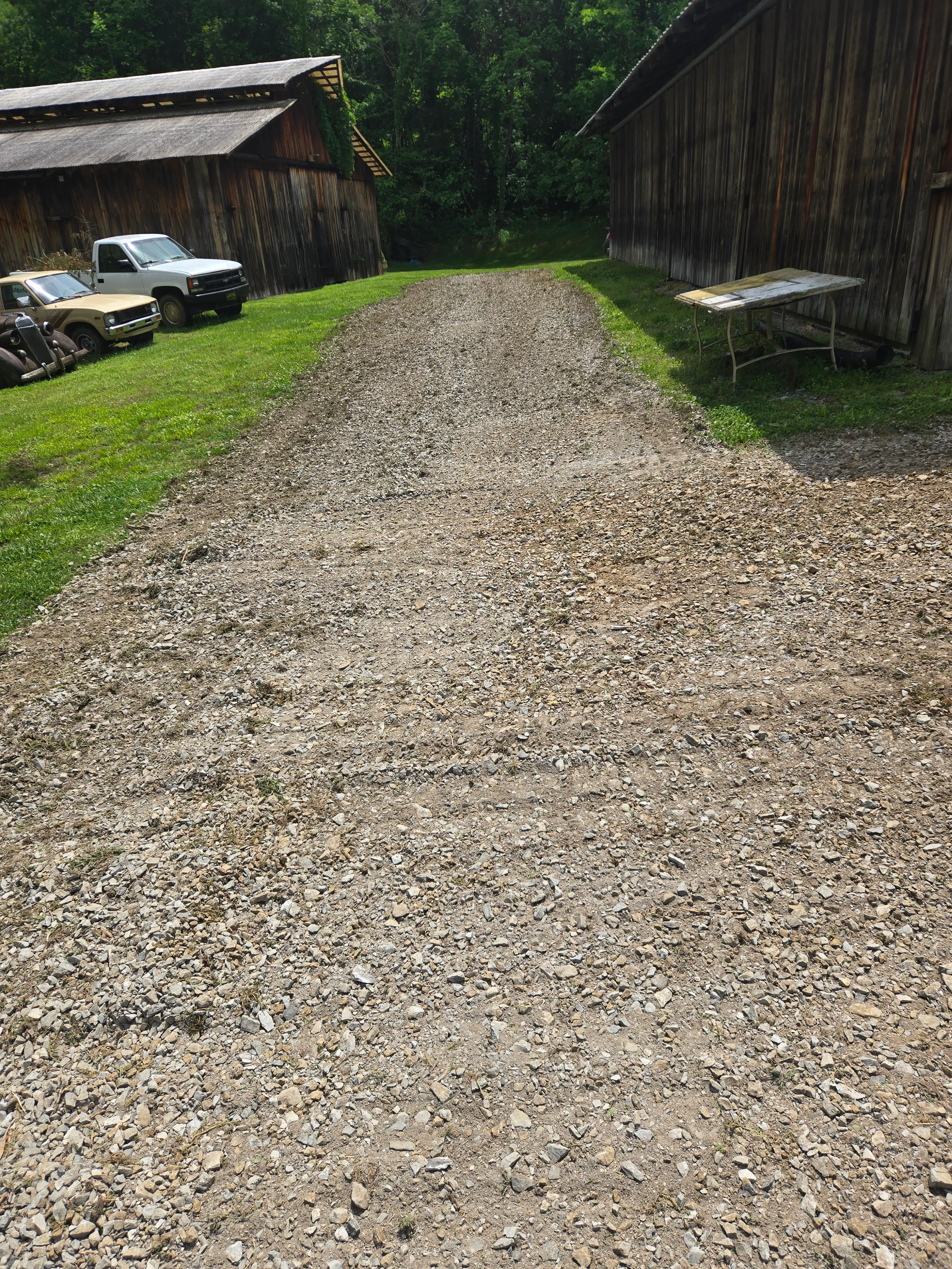 Gravel driveway after fresh stone and cleanup work