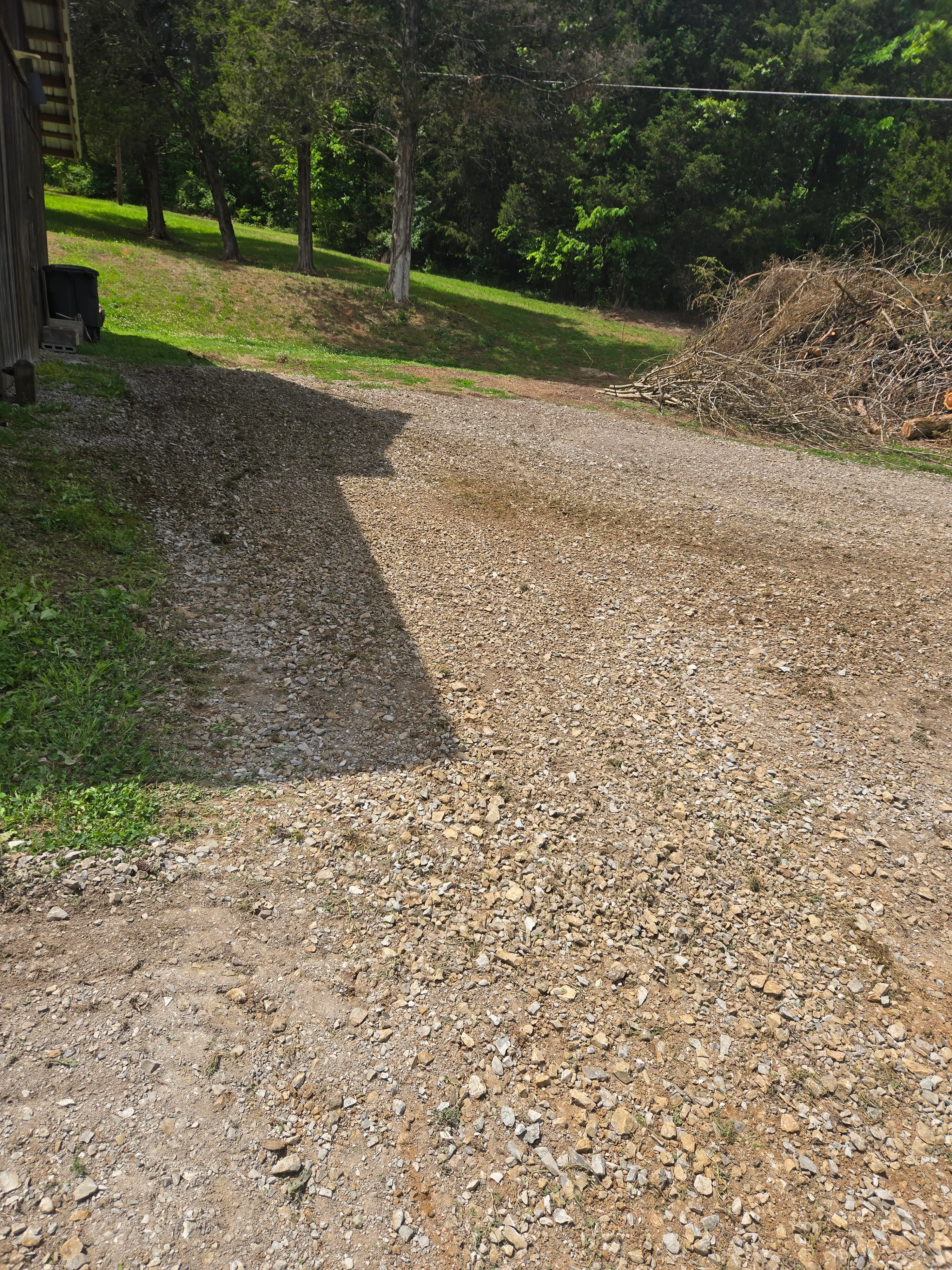 Gravel driveway after repair and fresh gravel