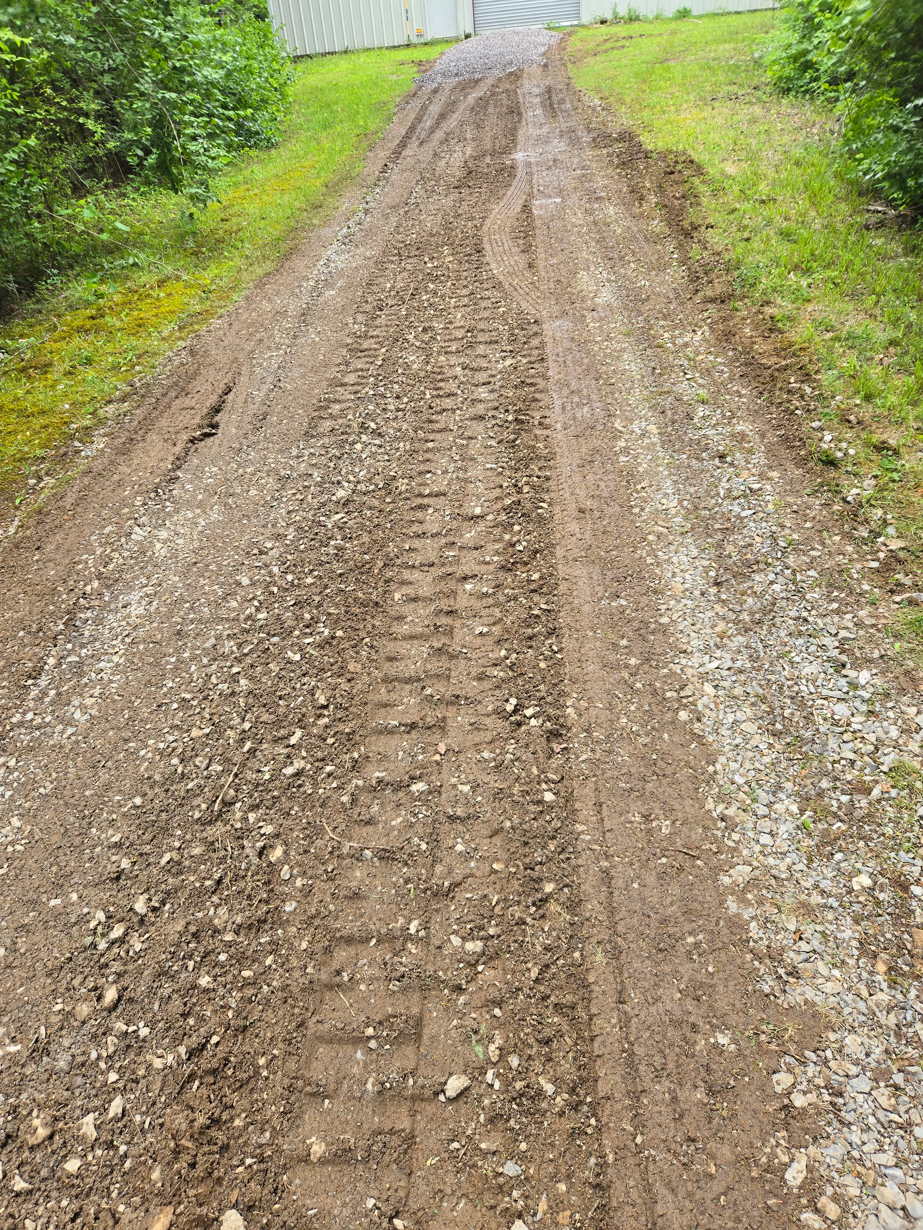 Gravel driveway before regrading